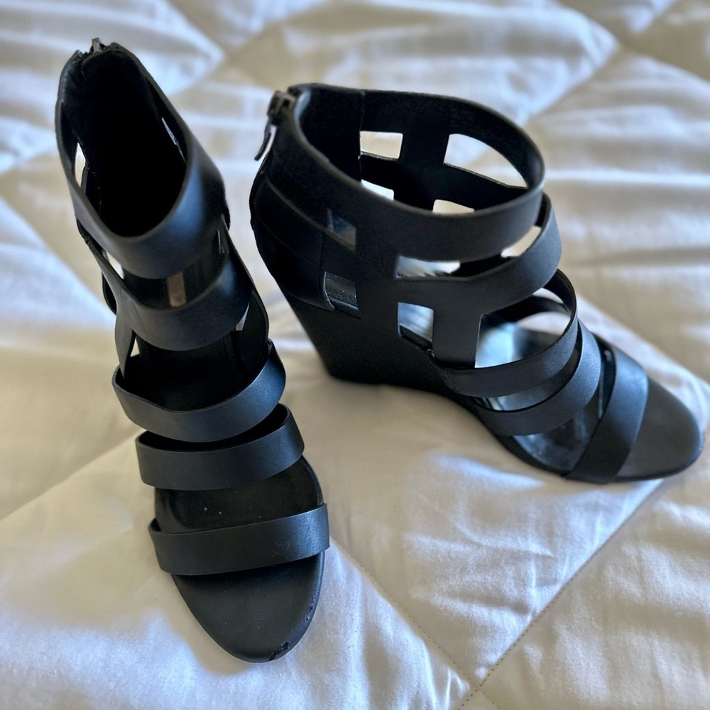 BCBGeneration Women’s Black Straps Wedge High Heal